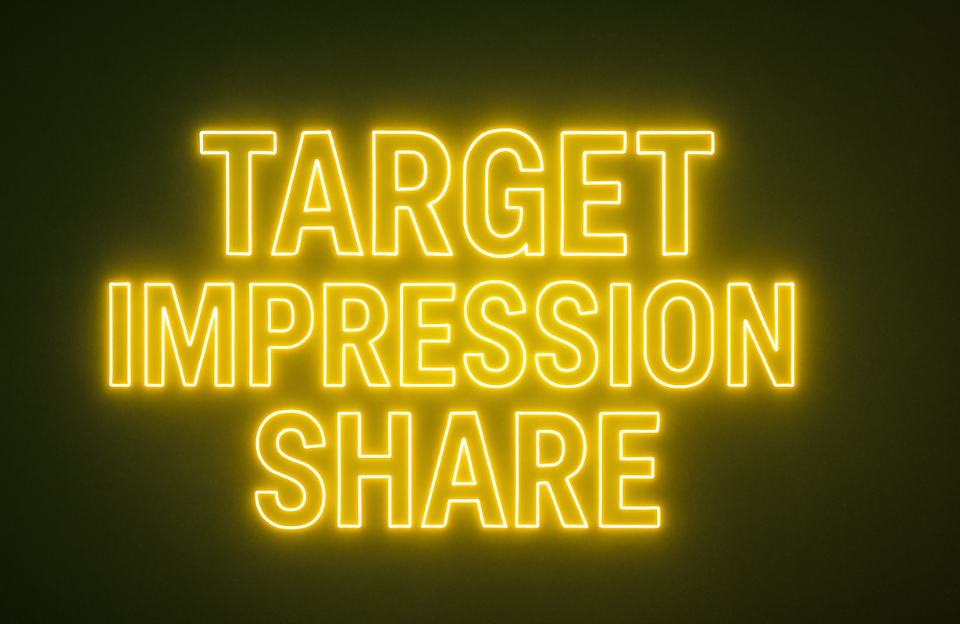 Neon-style text displaying “TARGET IMPRESSION SHARE” in bold yellow on a dark background