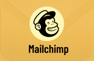 Illustration of Mailchimp’s mascot winking, with the Mailchimp name below, on a yellow envelope background